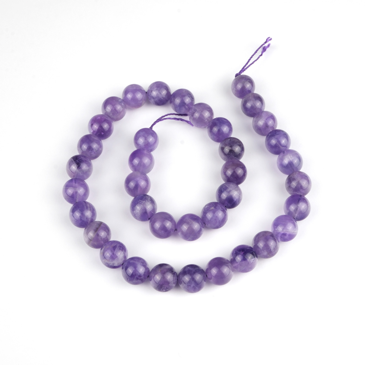 Ametist doğal taş dizi 10 mm – mor tonlarıyla dinginlik, sezgi gücü ve ruhsal koruma sağlayan toptan doğal taş dizi