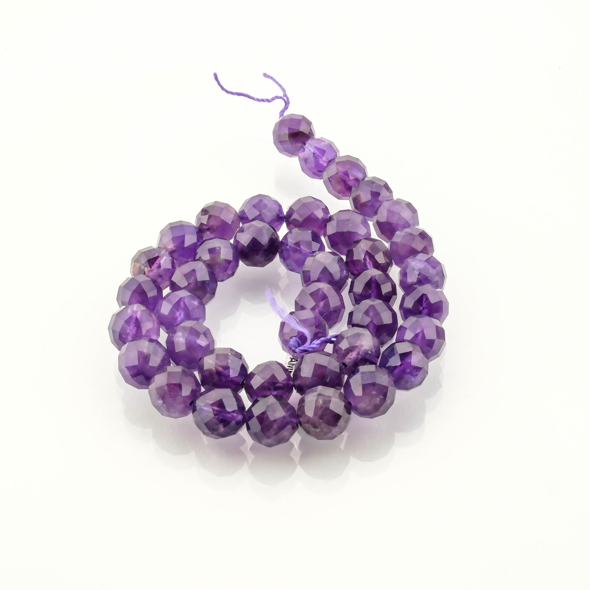 ametist-kesimli-dizi-dogal-tas-dizi-safir-tas-evi-toptan-dogal-tas-dizi-10mm-dizi-safir-tas-evi-2.jpg 2A Kalite Kesimli Ametist Doğal Taş Dizi (10mm) - Görsel 2