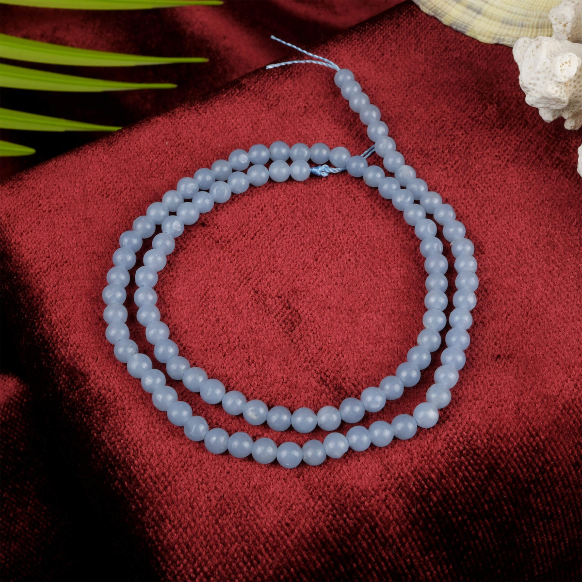 Anjelit doğal taş dizi 4 mm – açık mavi rengiyle huzur, şefkat ve iletişim enerjisini güçlendiren toptan doğal taş dizi