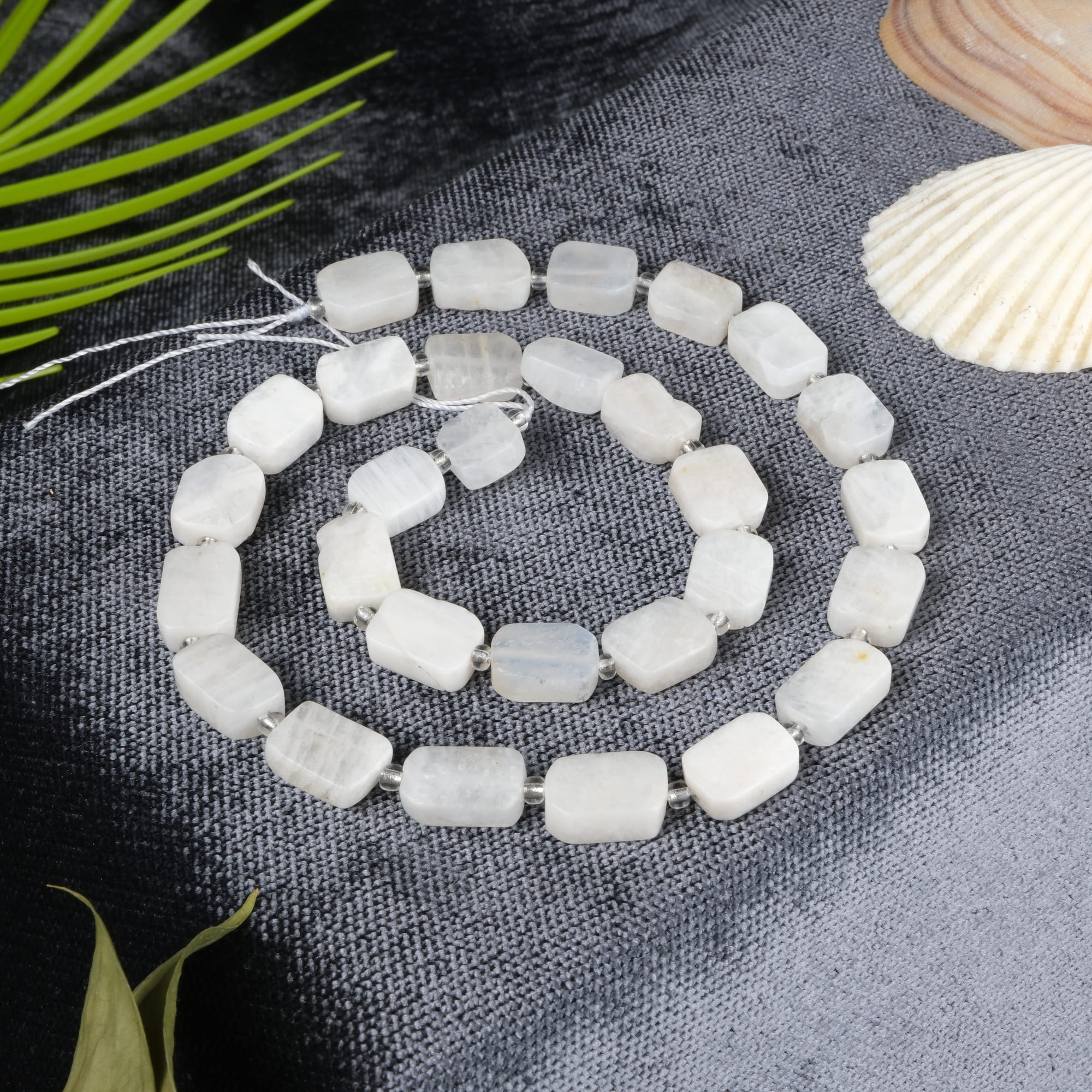aytasi-dizi-dogal-tas-dizi-8x12mm-yassi-safir-tas-evi-1.jpg Ay Taşı Doğal Taş Dizi (8x12mm Yassı Kesim) - Görsel 1