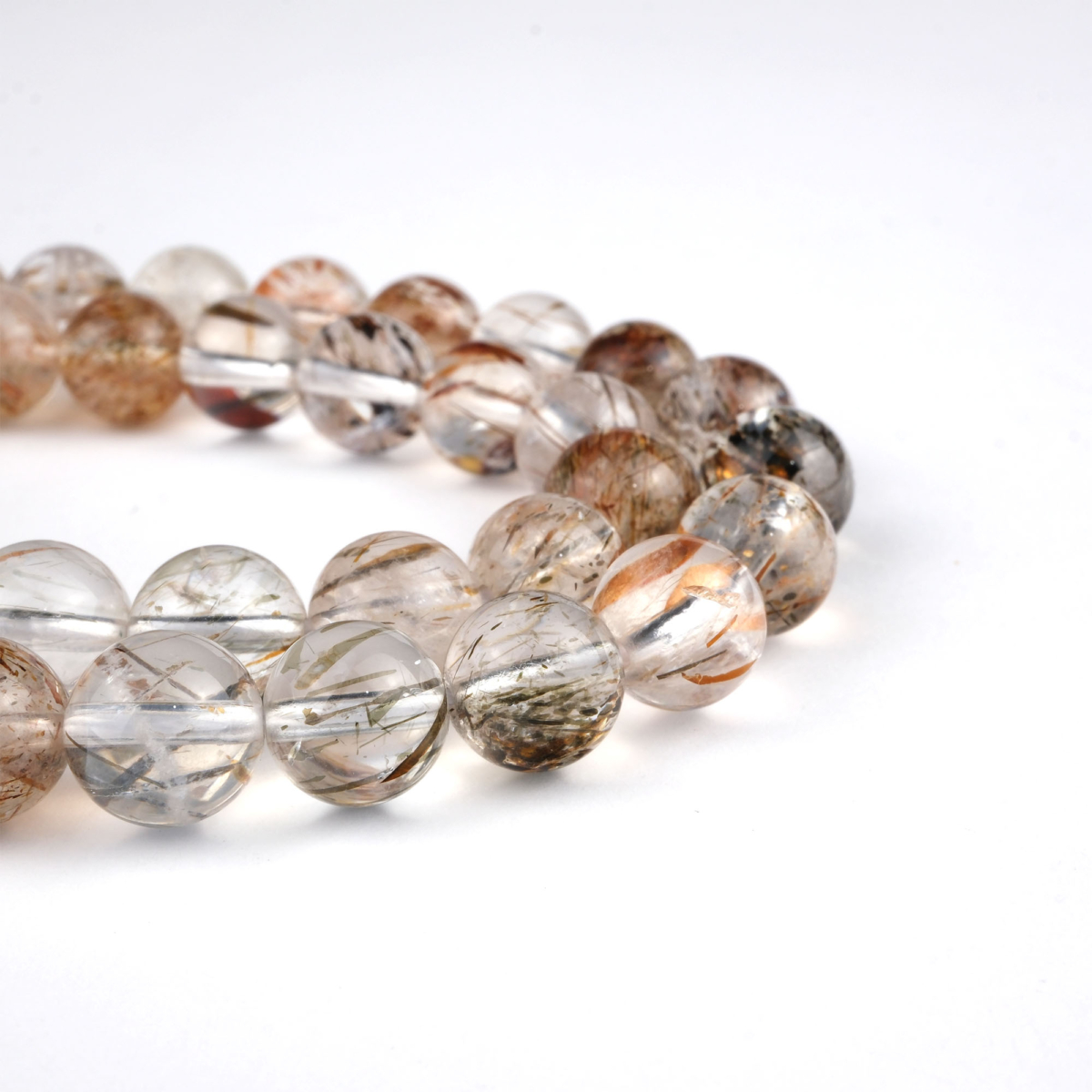 Bakır Rutilli Kuvars doğal taş dizi 8 mm – saydam kuvars içinde bakır renkli rutil kristalleriyle enerji yükseltici, koruyucu ve estetik toptan doğal taş dizi