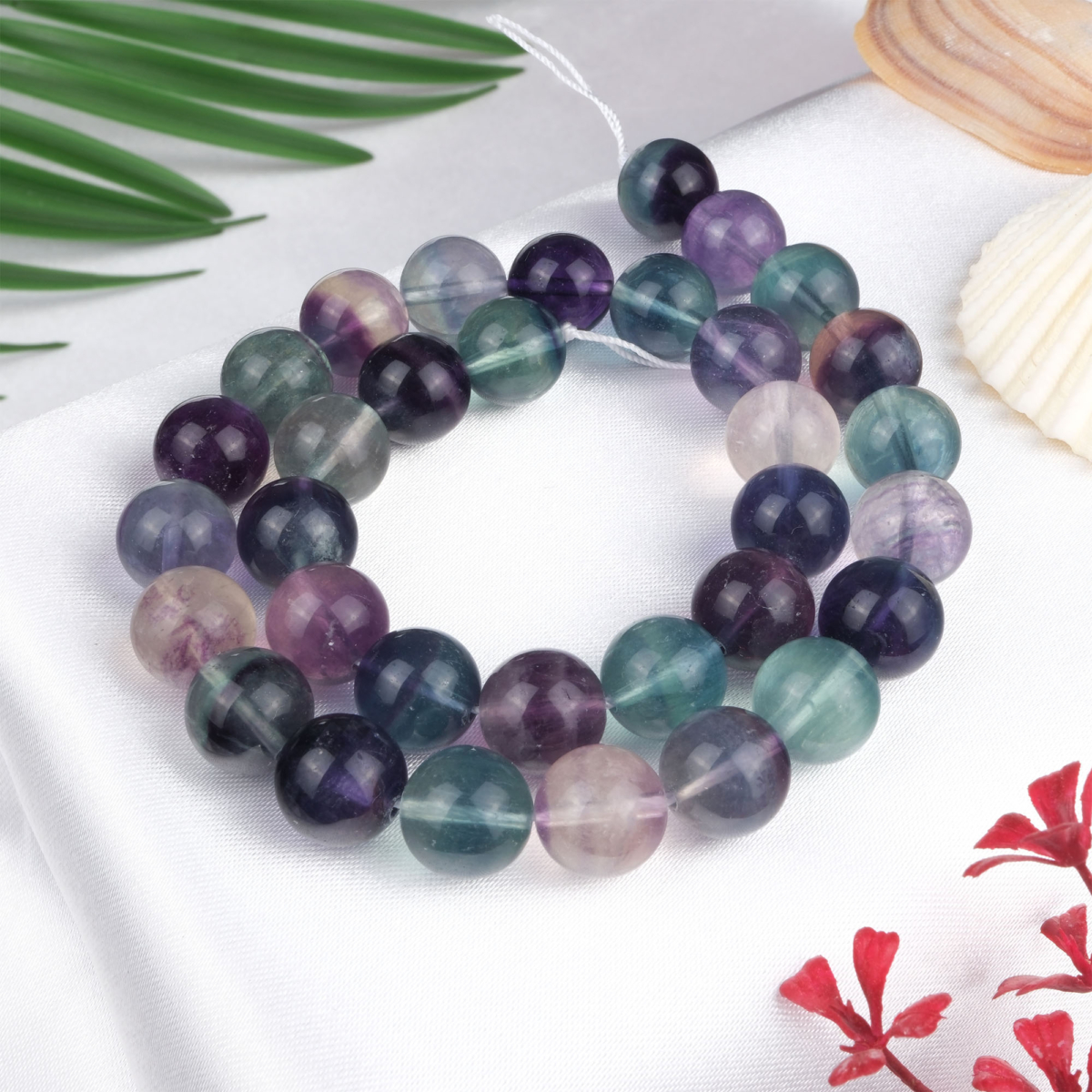 Florit doğal taş dizi 12 mm – mor, yeşil ve şeffaf tonlarıyla odaklanma, zihin açıklığı ve enerji dengeleme sağlayan toptan doğal taş dizi