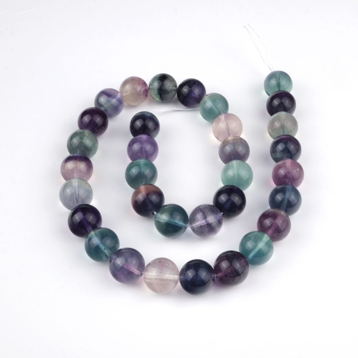 Florit doğal taş dizi 12 mm – mor, yeşil ve şeffaf tonlarıyla odaklanma, zihin açıklığı ve enerji dengeleme sağlayan toptan doğal taş dizi