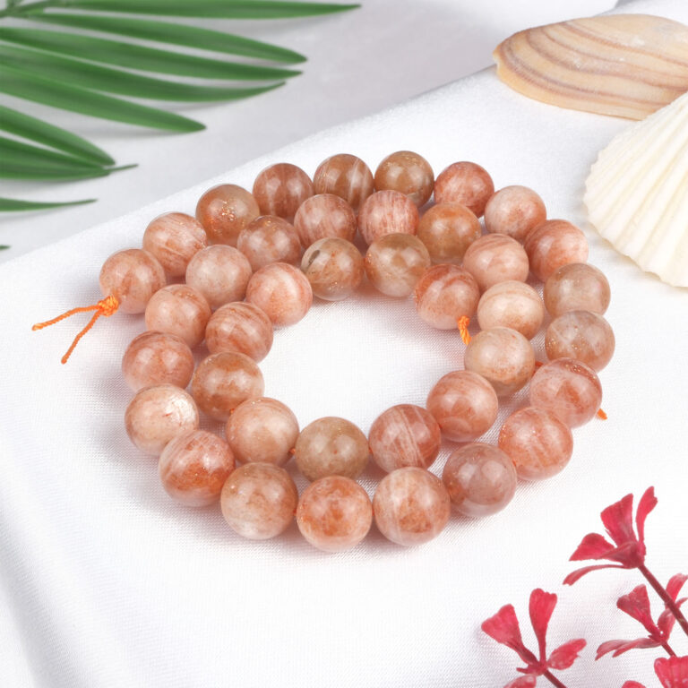 Güneştaşı doğal taş dizi 10 mm – altın ışıltılı turuncu tonlarıyla canlılık, özgüven ve pozitif enerji sağlayan toptan doğal taş dizi