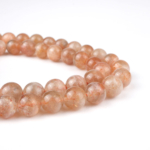 Güneş Taşı doğal taş dizi 7-8 mm – altın ışıltılı turuncu tonlarıyla canlılık, özgüven ve pozitif enerji sağlayan toptan doğal taş dizi