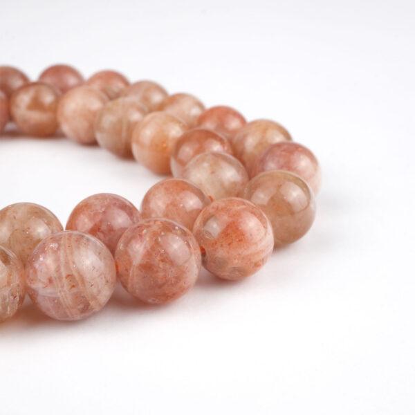 Güneştaşı doğal taş dizi 8 mm – altın ışıltılı tonlarıyla canlılık, özgüven ve pozitif enerji sağlayan toptan doğal taş dizi