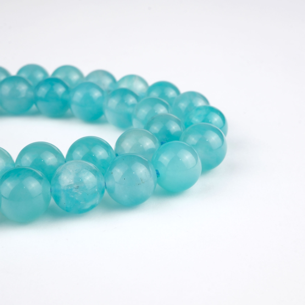 Jel Amazonit doğal taş dizi 8 mm – turkuaz ve yeşil tonlarında pozitif enerji, huzur ve iletişim gücü sağlayan toptan doğal taş dizi