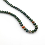 Kantaşı doğal taş dizi – toptan doğal taş dizi, koyu kırmızı tonlarıyla canlılık, dayanıklılık ve enerji dengeleme sağlayan taş.