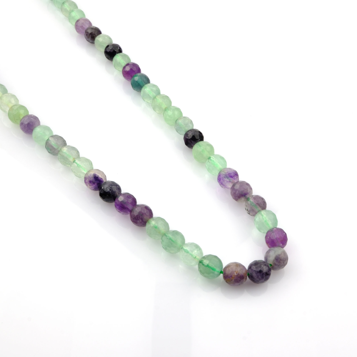 Kesimli Florit doğal taş dizi – toptan doğal taş dizi, mor, yeşil ve mavi tonlarıyla zihinsel berraklık ve denge sağlayan şifalı taş.