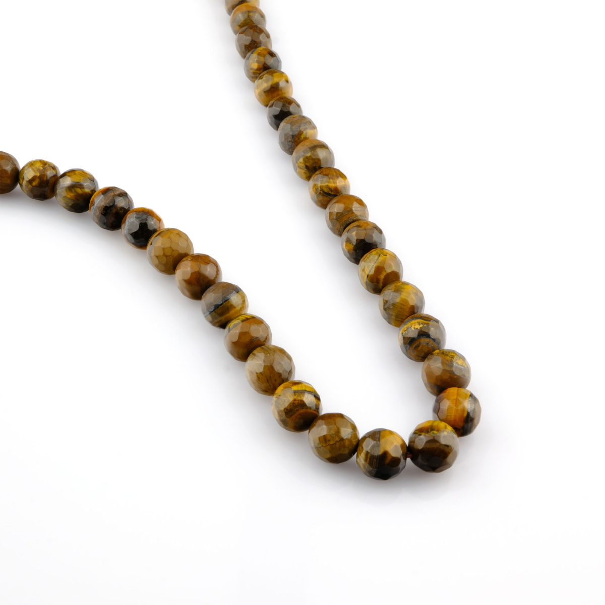 Kesimli Kaplangözü doğal taş dizi – toptan doğal taş dizi, altın kahverengi tonlarıyla güç, cesaret ve koruma enerjisi sunar.