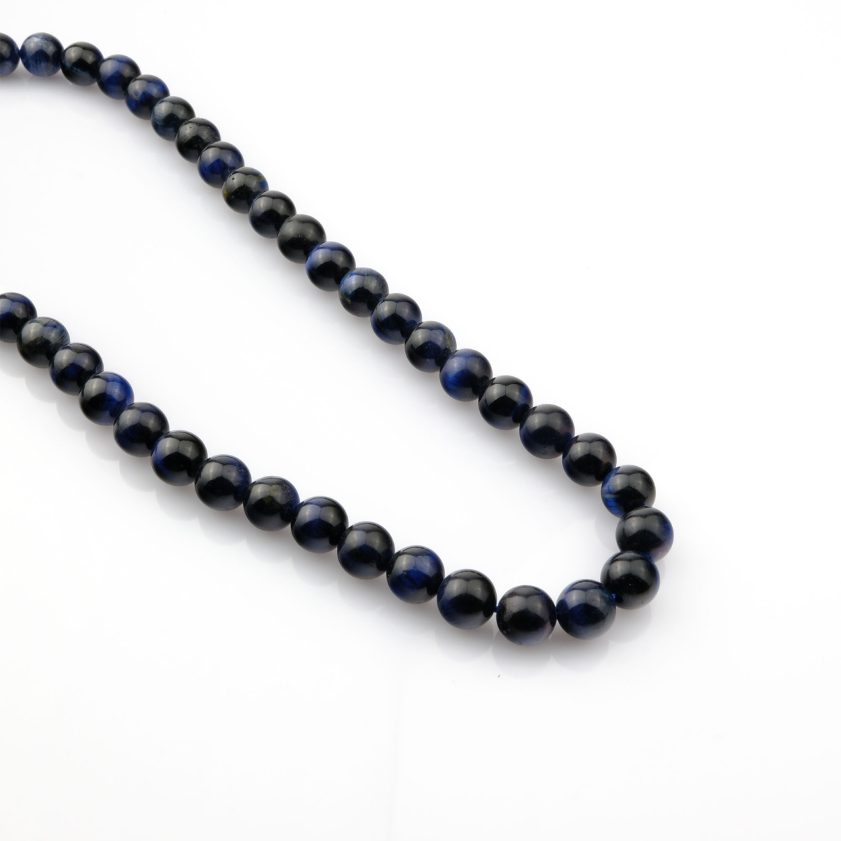 Lacivert Siyah Kaplangözü doğal taş dizi – toptan doğal taş dizi, derin mavi ve siyah tonlarıyla koruma, denge ve odak enerjisi sağlar.