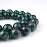 Malahit doğal taş dizi 10 mm – yeşilin farklı tonlarıyla dönüşüm, koruma ve enerji dengeleme sağlayan toptan doğal taş dizi