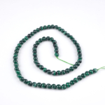 Malahit doğal taş dizi 5 mm – yeşil tonlarıyla dönüşüm, koruma ve kalp çakrası enerjisini dengeleyen toptan doğal taş dizi