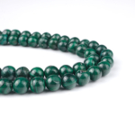 Malahit doğal taş dizi 6 mm – yeşil tonları ve dairesel desenleriyle dönüşüm, koruma ve enerji dengesini destekleyen toptan doğal taş dizi