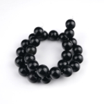 Obsidyen doğal taş dizi 14 mm – volkanik kökenli yapısıyla güçlü koruma, farkındalık ve enerji arınması sağlayan toptan doğal taş dizi