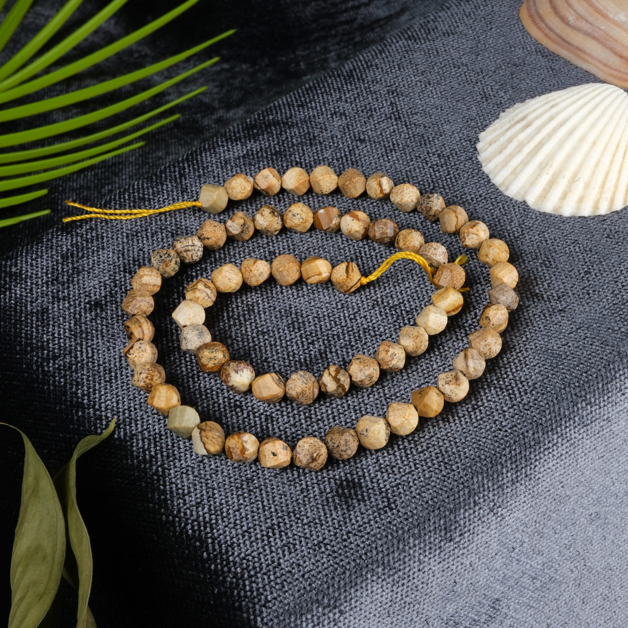 odun-jasper-dizi-dogal-tas-dizi-6mm-burgu-kesim-safir-tas-evi-1.jpg Odun Jasper Doğal Taş Dizi (6mm Burgu Kesim) - Görsel 1