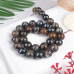 Pietersite doğal taş dizi 12 mm – mavi, kahverengi ve altın tonlarıyla içsel güç, farkındalık ve ruhsal dönüşüm sağlayan toptan doğal taş dizi