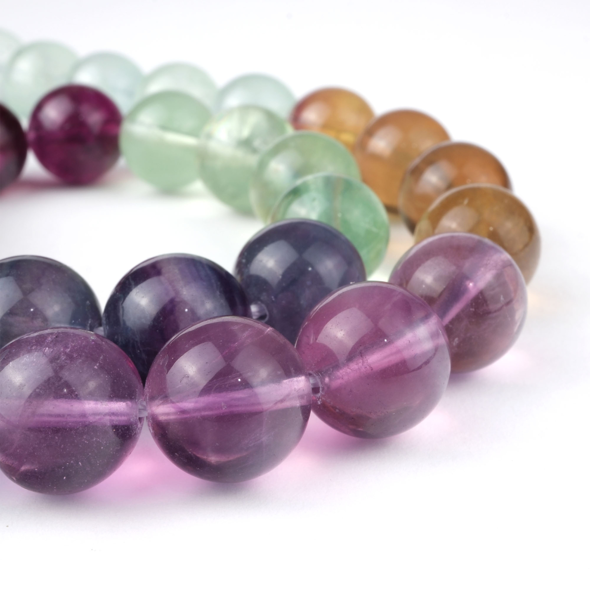 Rainbow Florit doğal taş dizi 12 mm – mor, yeşil ve mavi tonlarıyla odaklanma, zihin açıklığı ve enerji dengeleme sağlayan toptan doğal taş dizi