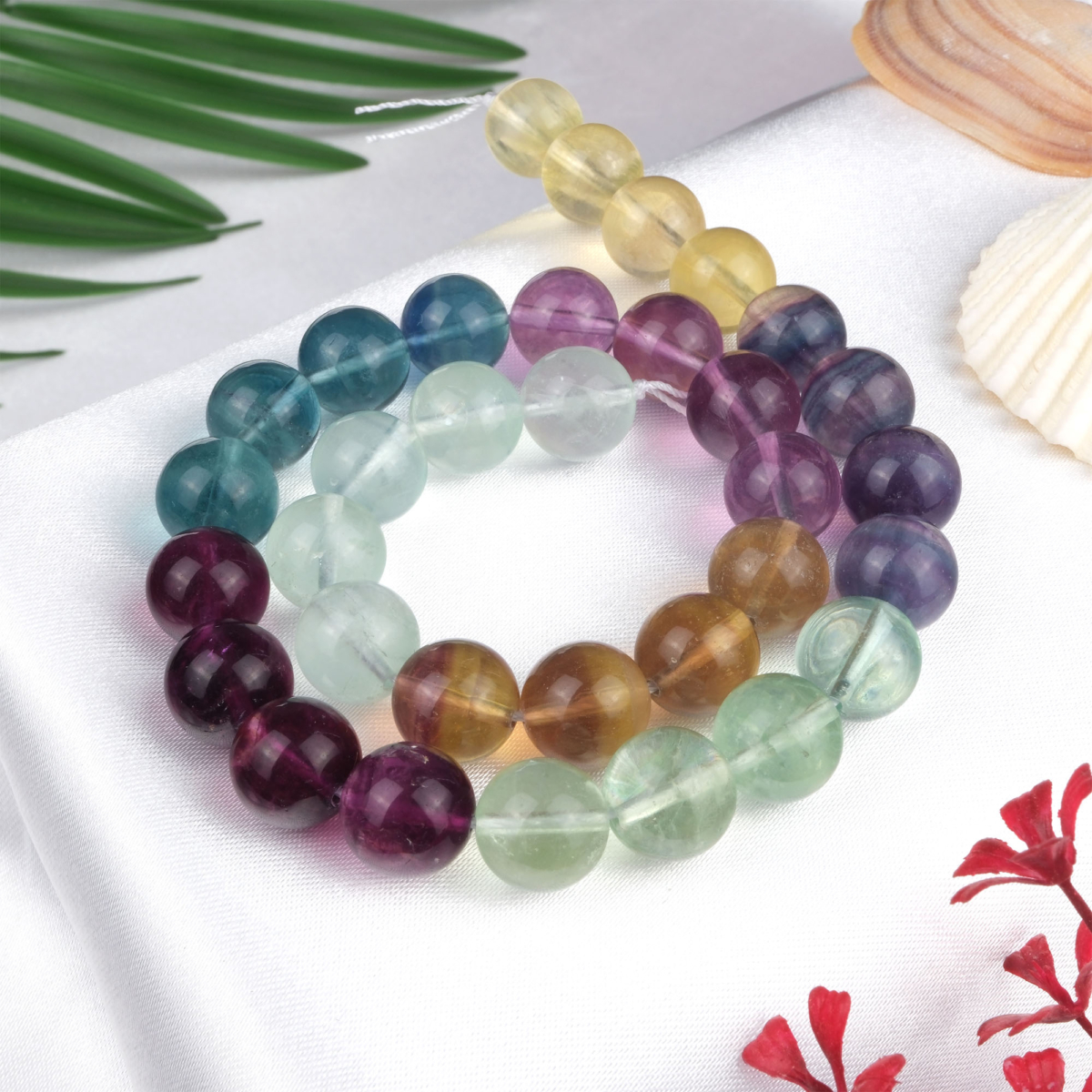 Rainbow Florit doğal taş dizi 12 mm – mor, yeşil ve mavi tonlarıyla odaklanma, zihin açıklığı ve enerji dengeleme sağlayan toptan doğal taş dizi