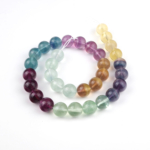 Rainbow Florit doğal taş dizi 12 mm – mor, yeşil ve mavi tonlarıyla odaklanma, zihin açıklığı ve enerji dengeleme sağlayan toptan doğal taş dizi