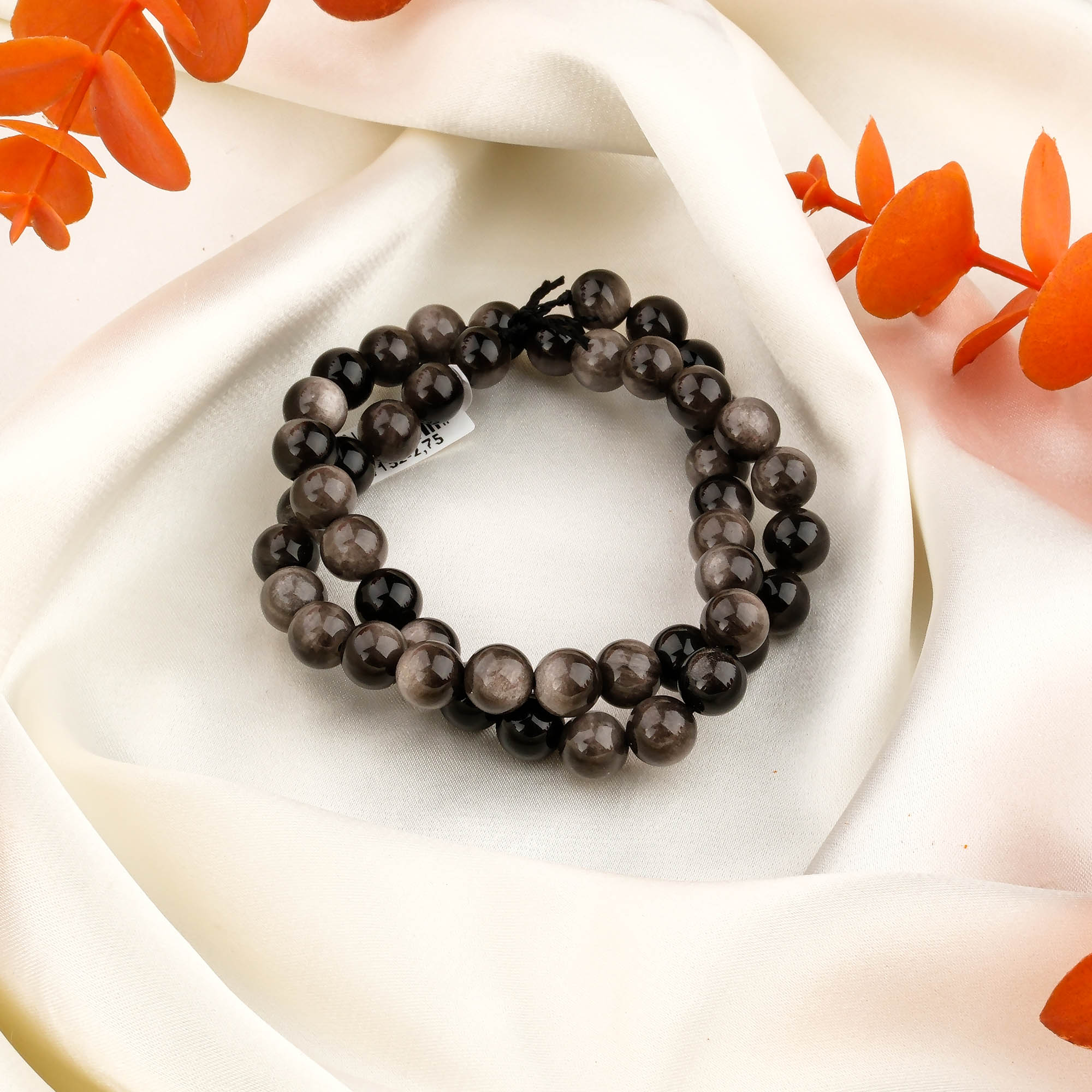 silver-obsidyen-dizi-dogal-tas-dizi-safir-tas-evi-8mm-toptan-siyah-gumus-damarli-1.jpg Silver Obsidyen Doğal Taş Dizi (8mm) - Görsel 1