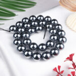 Teraherz doğal taş dizi 12 mm – gümüş gri metalik parlaklığıyla enerji dengeleme, frekans yükseltme ve canlılık sağlayan toptan doğal taş dizi