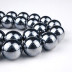 Teraherz doğal taş dizi 12 mm – gümüş gri metalik parlaklığıyla enerji dengeleme, frekans yükseltme ve canlılık sağlayan toptan doğal taş dizi