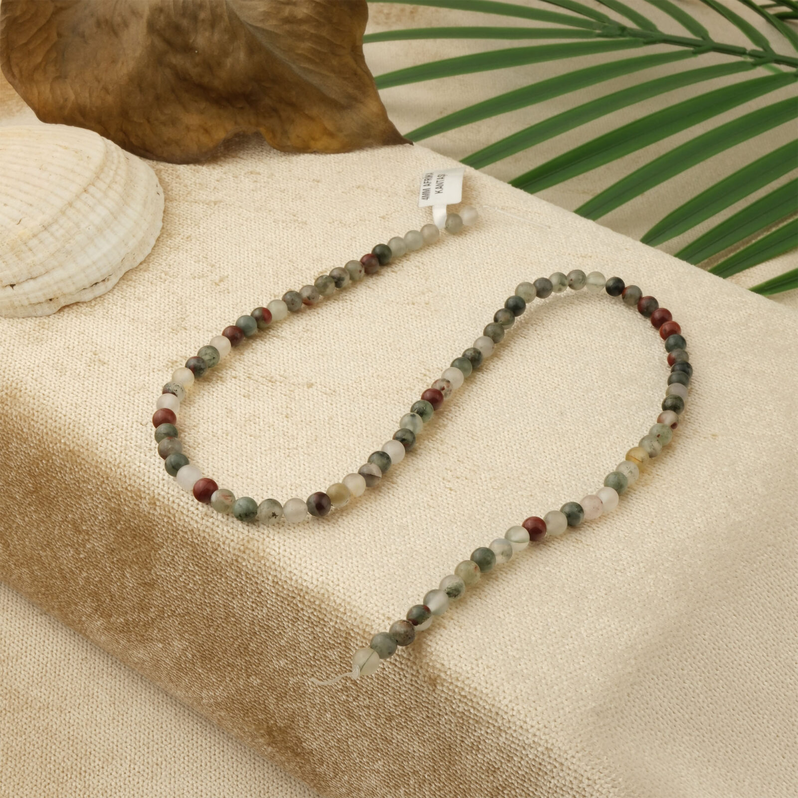 Afrika Kan Taşı doğal taş dizi 4mm – yeşil, kırmızı ve gri tonlarıyla güç, canlılık ve koruma enerjisi yayan toptan doğal taş dizi.