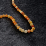 Aragonit doğal taş dizi 8mm – toprak enerjisiyle denge, huzur ve stres giderici etki sunan toptan doğal taş dizi.