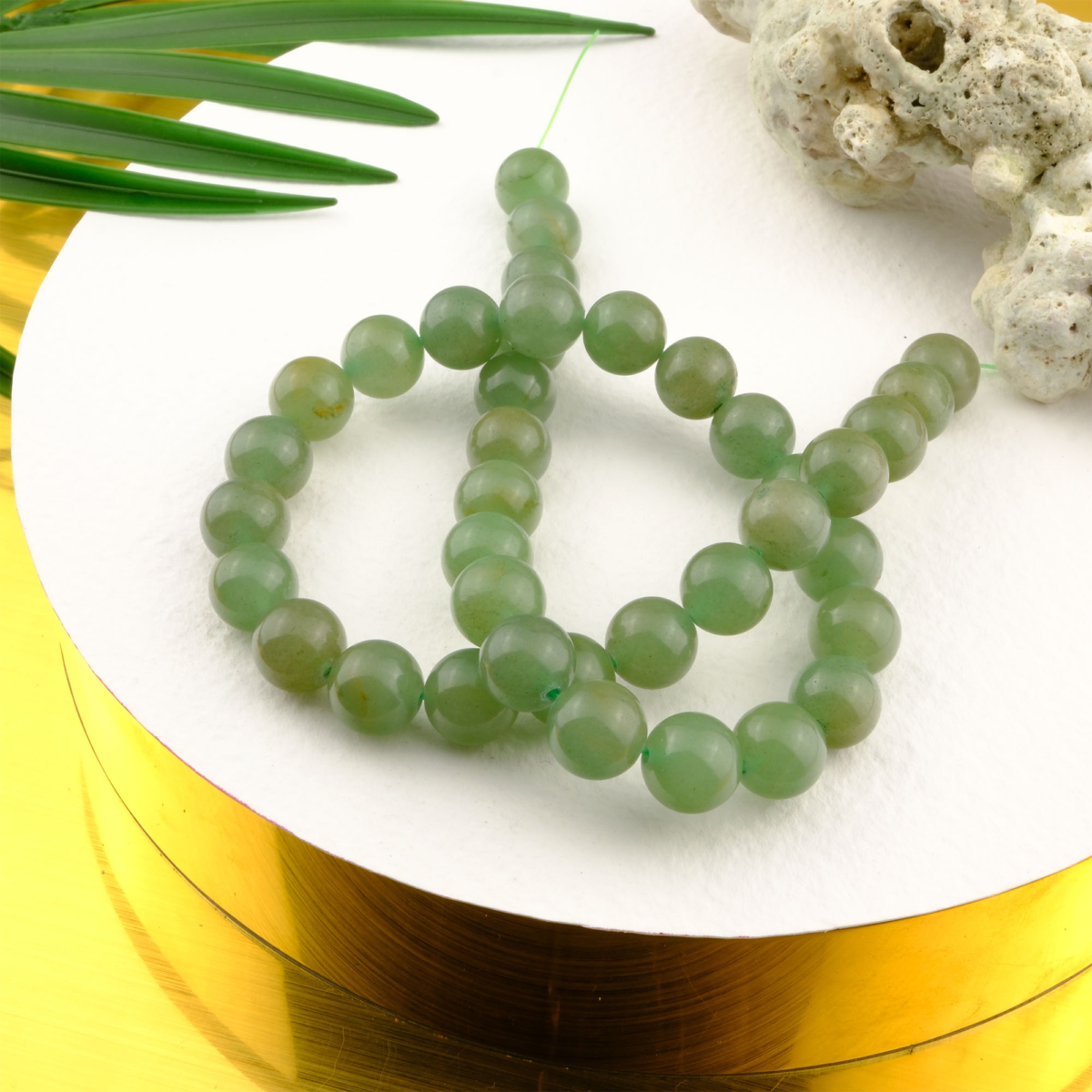 Aventurin doğal taş dizi 10mm – yeşilin huzur verici tonlarıyla bolluk, şans ve denge enerjisini yayan zarif görünümlü toptan doğal taş dizi.