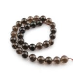 Dumanlı Kuvars doğal taş dizi 12mm – kahverengi tonlarıyla negatif enerjiyi arındıran, denge ve koruma sağlayan toptan doğal taş dizi.