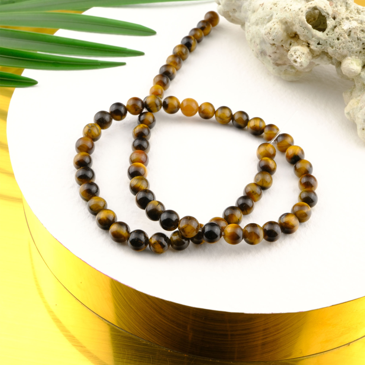 Kaplangözü doğal taş dizi 6mm – altın kahverengi ışıltısıyla odaklanma, cesaret ve iç denge enerjisi sağlayan toptan doğal taş dizi