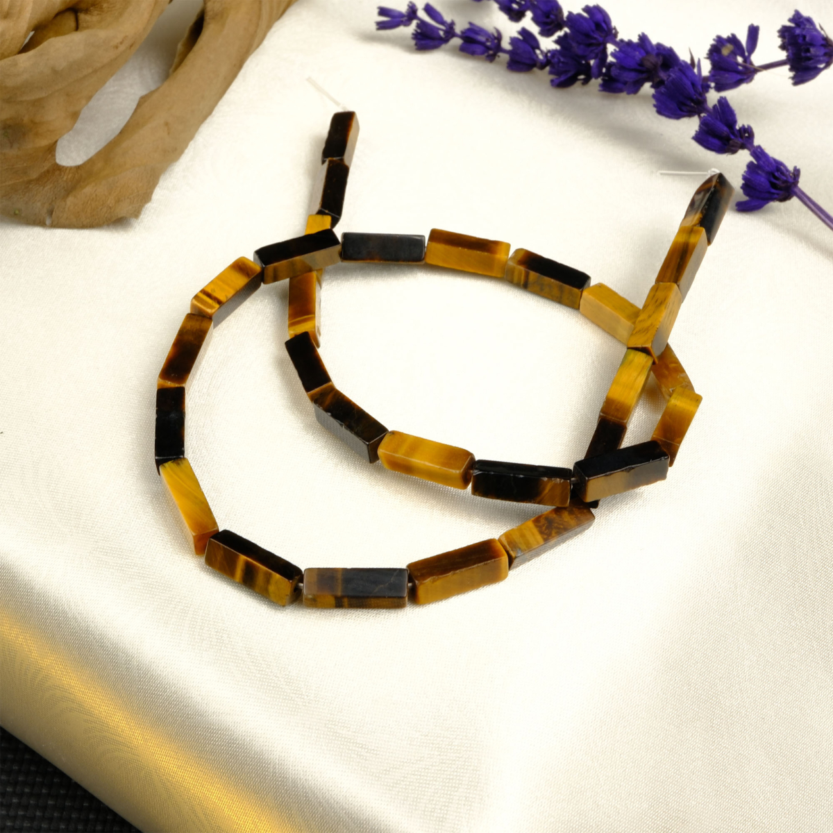 Kaplangözü doğal taş dizi — toptan doğal taş dizi; altın kahverengi çizgileriyle koruma, cesaret ve odaklanma enerjisi sağlayan taş.