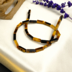 Kaplangözü doğal taş dizi — toptan doğal taş dizi; altın kahverengi çizgileriyle koruma, cesaret ve odaklanma enerjisi sağlayan taş.