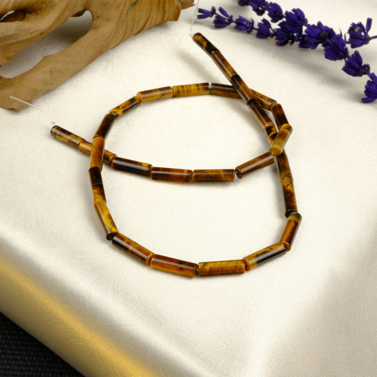 Kaplangözü doğal taş dizi — toptan doğal taş dizi; altın kahverengi ışıltısıyla cesaret, kararlılık ve odaklanma enerjisi sağlayan taş.