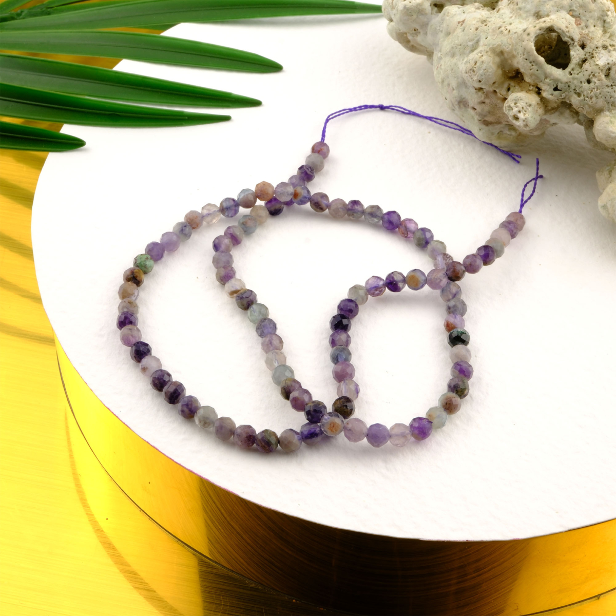 Kesimli Florit doğal taş dizi 4mm – mor, yeşil ve şeffaf tonlarıyla zihinsel berraklık ve denge sağlayan toptan doğal taş dizi.