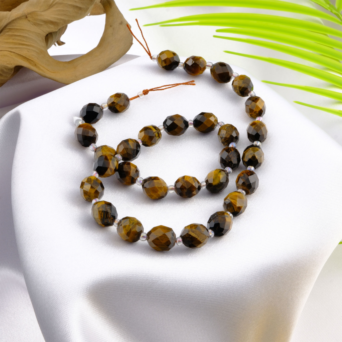 Kesimli Kaplangözü doğal taş dizi 8-10 mm – cesaret, özgüven ve koruma enerjisini artıran toptan doğal taş dizi