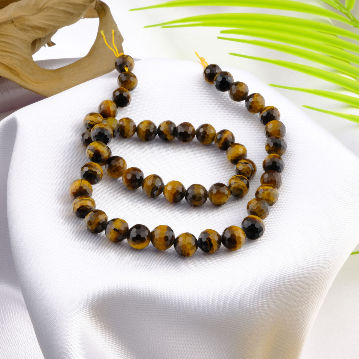 Kesimli Kaplangözü doğal taş dizi 8mm – canlı altın kahverengi yansımalarıyla koruma, cesaret ve denge enerjisi sunan toptan doğal taş dizi