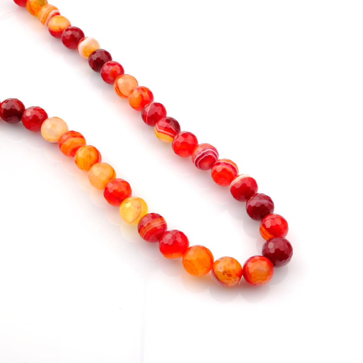 Kesimli Madagaskar Akik toptan doğal taş dizi 10mm – doğal renk geçişleriyle denge, koruma ve iç huzur enerjisi sunan özel taş.