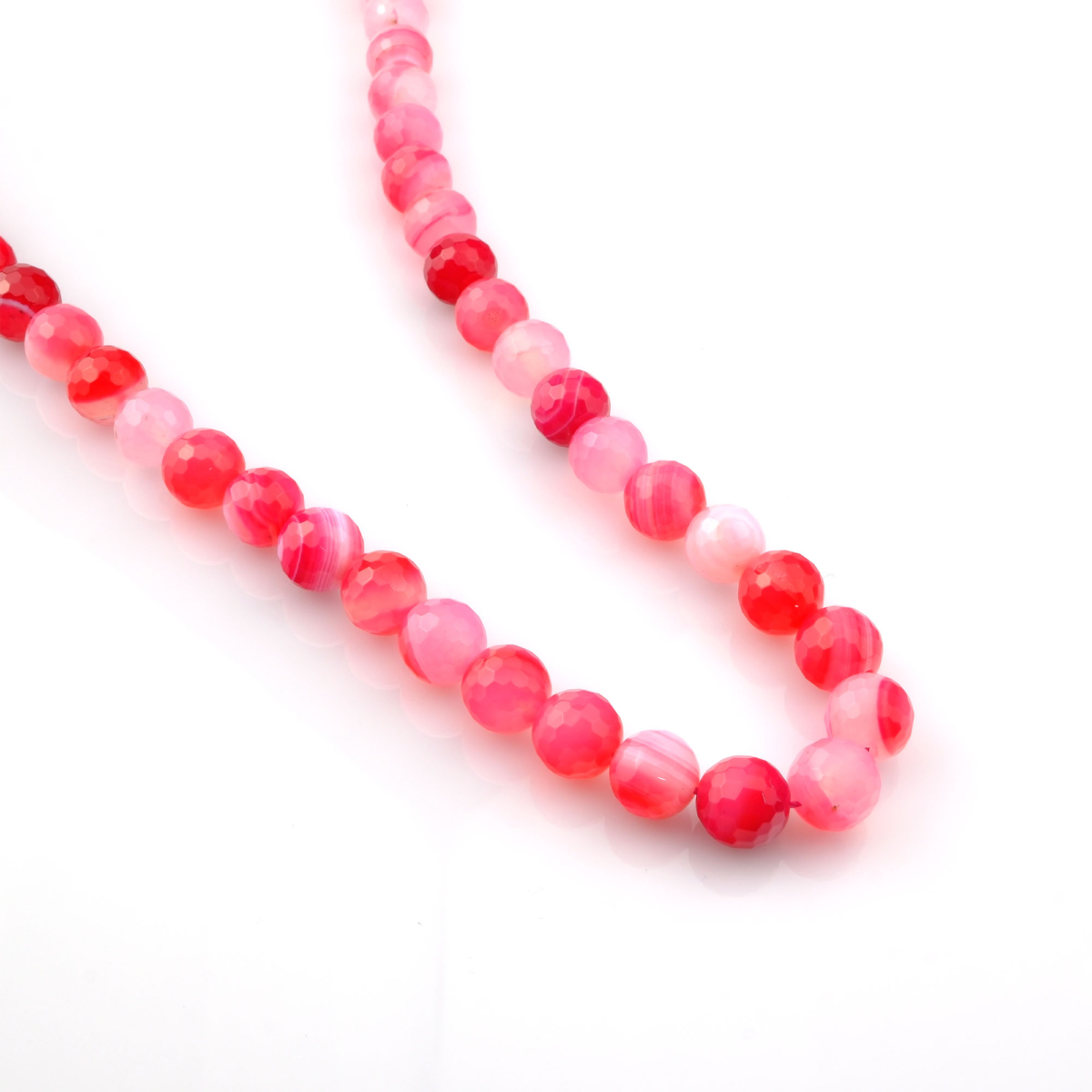 Kesimli Madagaskar Pembe Akik toptan doğal taş dizi 10mm – yumuşak pembe tonlarıyla sevgi, huzur ve duygusal denge enerjisi sunan doğal taş.