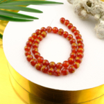 Kırmızı Feng Shui doğal taş dizi 8mm – canlı kırmızı tonlarıyla enerji ve tutku yayan, dengeleyici etkisiyle takı tasarımlarında tercih edilen toptan doğal taş dizi.