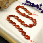 Kırmızı Jasper doğal taş dizi — toptan doğal taş dizi; canlı kırmızı tonlarıyla güç, kararlılık ve enerji dengeleyici etkiler sunan taş.