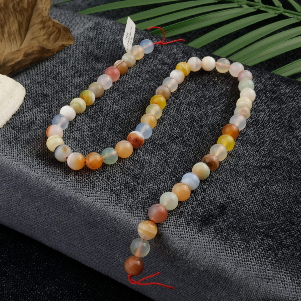 Madagaskar Akik doğal taş dizi 8mm – toprak tonlarında sabır, denge ve koruma enerjisi taşıyan toptan doğal taş dizi