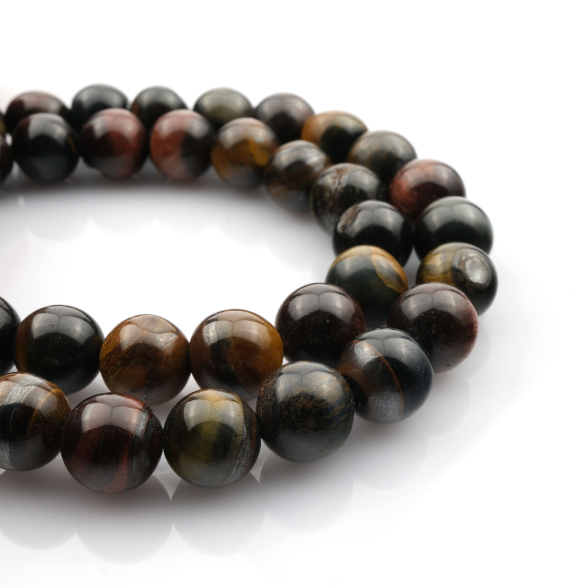 Mix Kaplangözü doğal taş dizi 8mm – kahverengi, altın ve mavi tonların birleşimiyle koruma ve güç enerjisi yayan toptan doğal taş dizi.