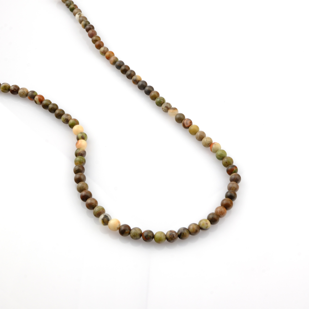 Mix Riyolit doğal taş dizi 4mm – doğadan ilham alan yeşil, kahverengi ve sarı tonlarıyla denge ve yenilenme enerjisi sunan toptan doğal taş dizi.