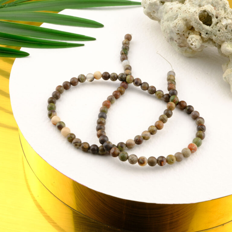 Mix Riyolit doğal taş dizi 4mm – doğadan ilham alan yeşil, kahverengi ve sarı tonlarıyla denge ve yenilenme enerjisi sunan toptan doğal taş dizi.