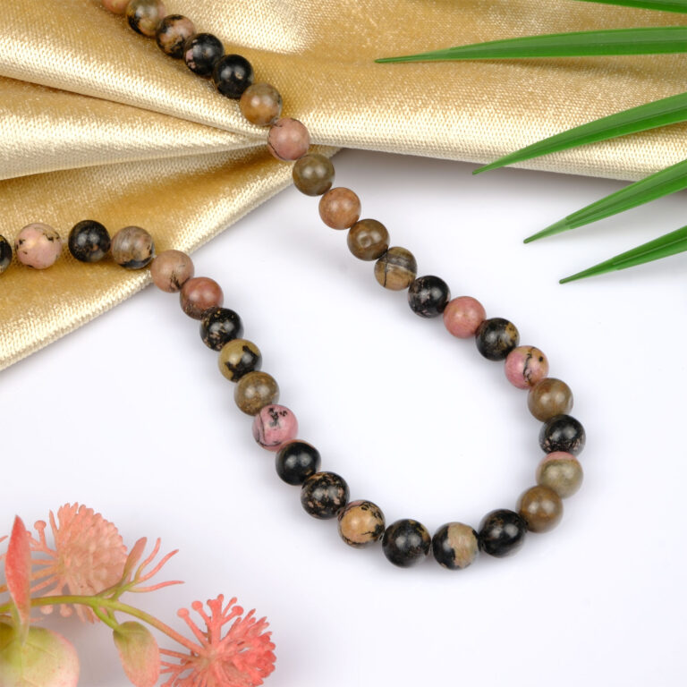 Rodonit doğal taş dizi 10mm – pembe ve siyah damarlarıyla sevgi, denge ve şifa enerjisi yayan toptan doğal taş dizi.