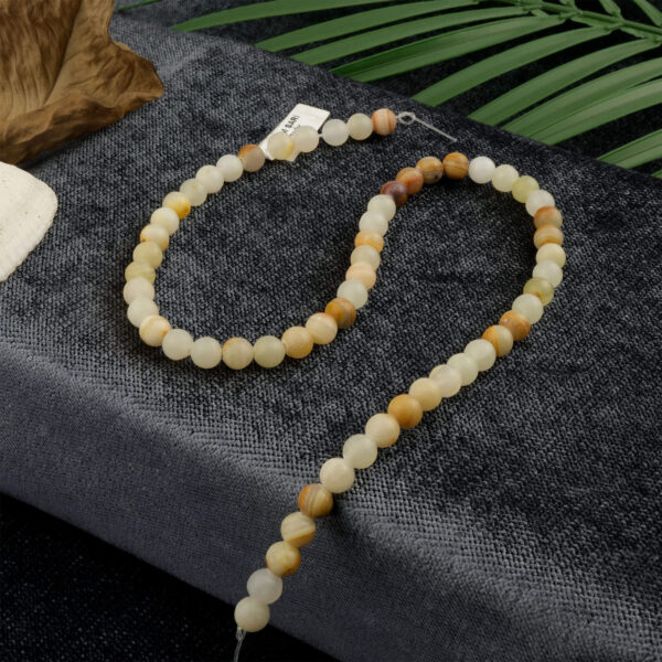 Sarı Oniks doğal taş dizi 6mm – sıcak sarı tonlarıyla pozitif enerji, neşe ve özgüven kazandıran toptan doğal taş dizi.