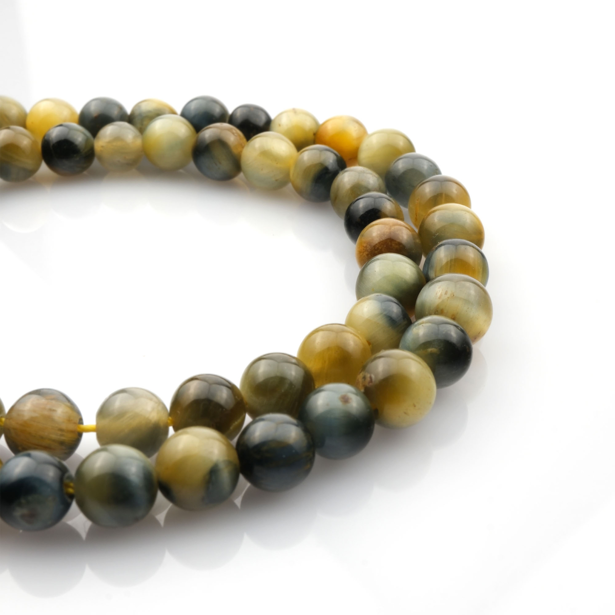 Sarı Siyah Kaplan Gözü doğal taş dizi 6mm – kontrast renkleriyle koruma, güç ve odaklanma enerjisini birleştiren toptan doğal taş dizi.