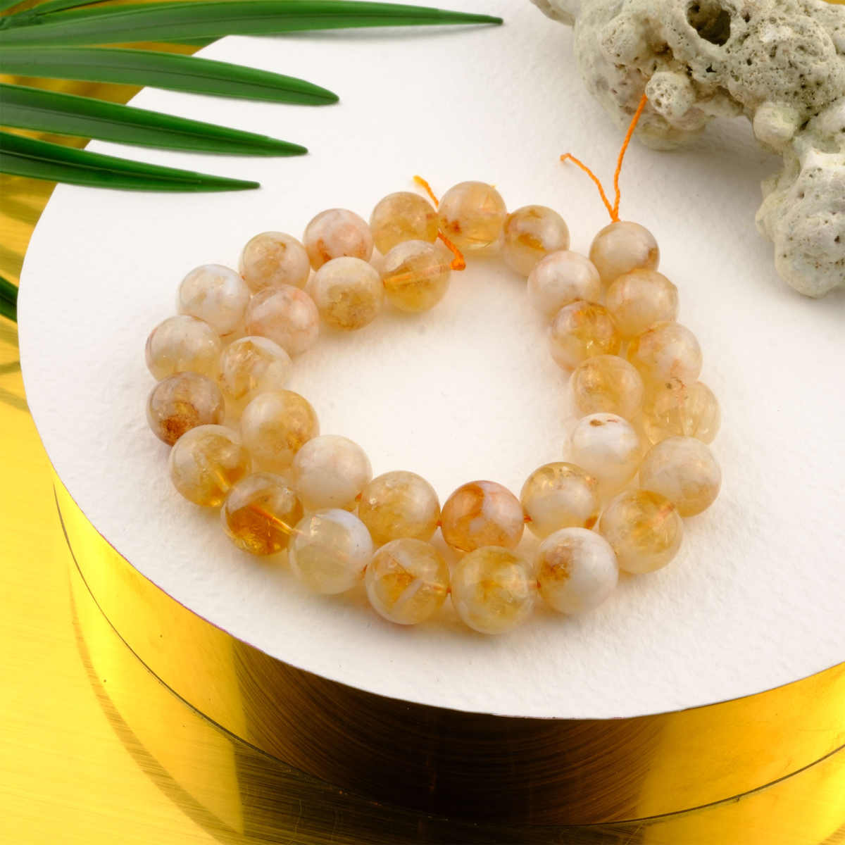 Sitrin toptan doğal taş dizi 12mm – altın sarısı tonlarıyla bolluk, enerji ve neşe frekansını yayan güçlü doğal taş modeli.